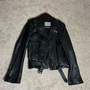 Understated Leather extreme bell sleeve genuine leather.